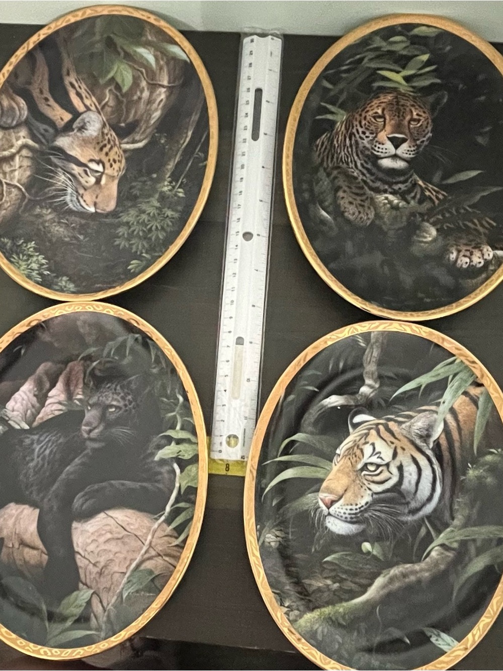 Set of 4 Wildlife Wall Plaques guardians of the wild in Black and Gold.